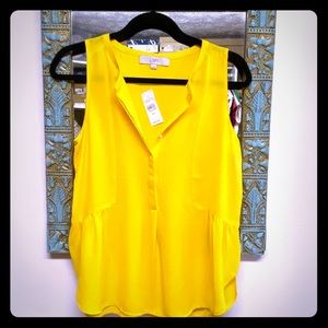 Flirty peplum chiffon top with button detail